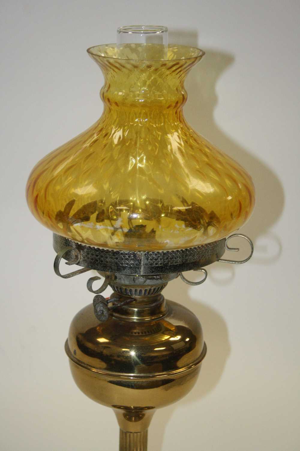A late 19th century brass oil lamp, having amber tinted glass shade, h.58cm - Image 2 of 4