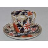 A circa 1900 Fischer & Miel Pirkenhammer Bohemian porcelain coffee can and saucer, decorated in