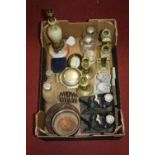 A box of miscellaneous items, to include a pair of Victorian brass table candlesticks and an onyx