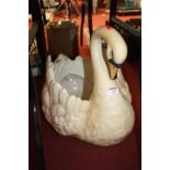 A large pottery jardiniere in the form of a swan, h.43cm