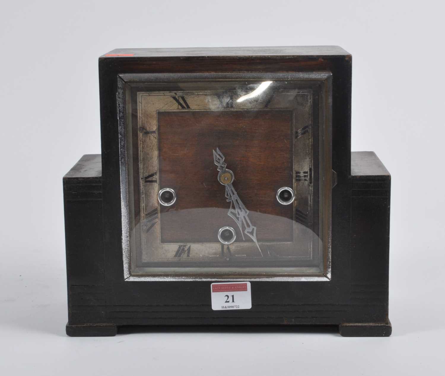 An Art Deco Enfield oak cased eight-day mantel clock, h.22cm