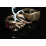 A gent's 9ct gold signet ring; a gent's 9ct gold garnet set snake ring (with solder repair and one