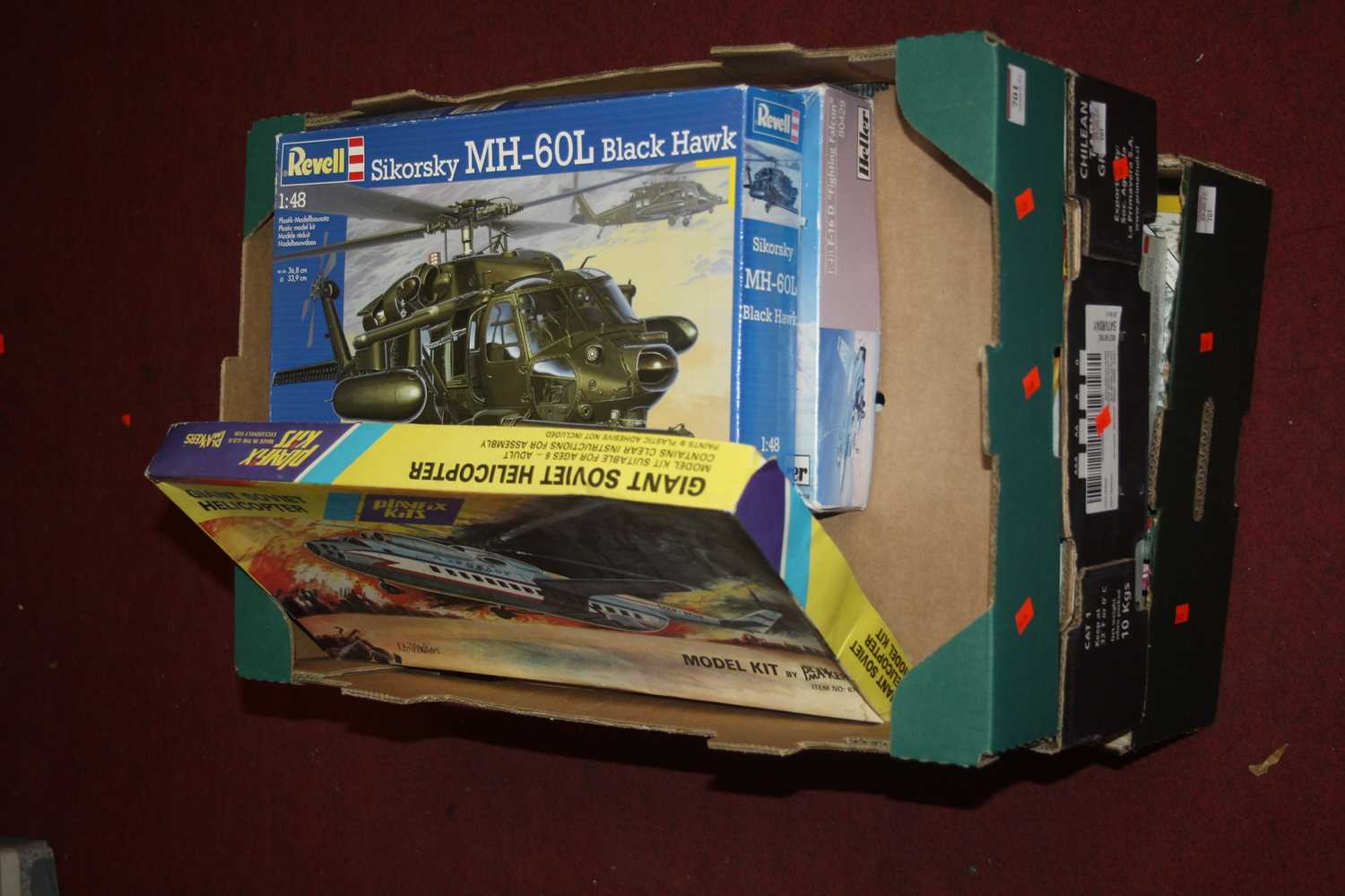 Three boxes of plastic kits to include Revell, Heller, Airfix etc