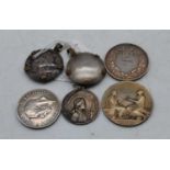 Various items to include a British WWI medal, medallions etc