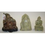 A modern resin figure of Buddha, h.17cm; together with two other similar (3)