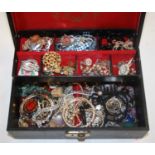 A box of miscellaneous costume jewellery, to include bangles, beaded necklaces, brooches etc