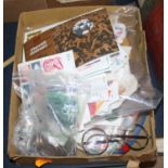 A box of miscellaneous items, to include coinage, stamps and vintage spectacles