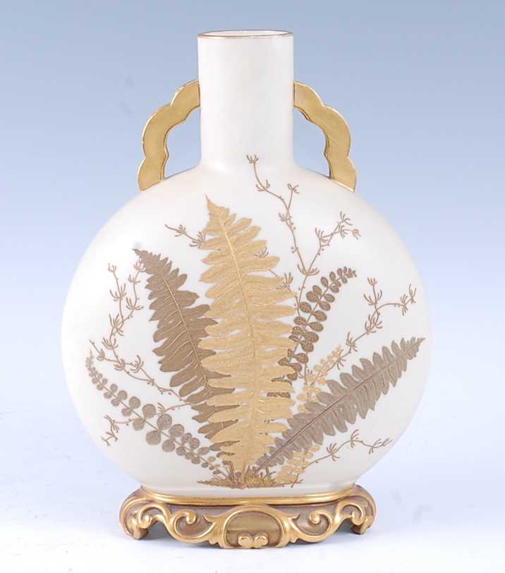 A Royal Worcester old ivory porcelain moon vase, the cylindrical neck flanked by twin gilt