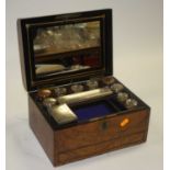 A Victorian burr walnut travelling box, having fitted interior, the fitments with silver plated