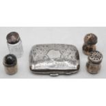 A George V silver pocket cigarette case of rounded rectangular form having foliate engraved