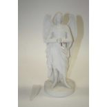 A Victorian parian figure of St Michael, h.32.5cmThe object which he was holding is missing. There