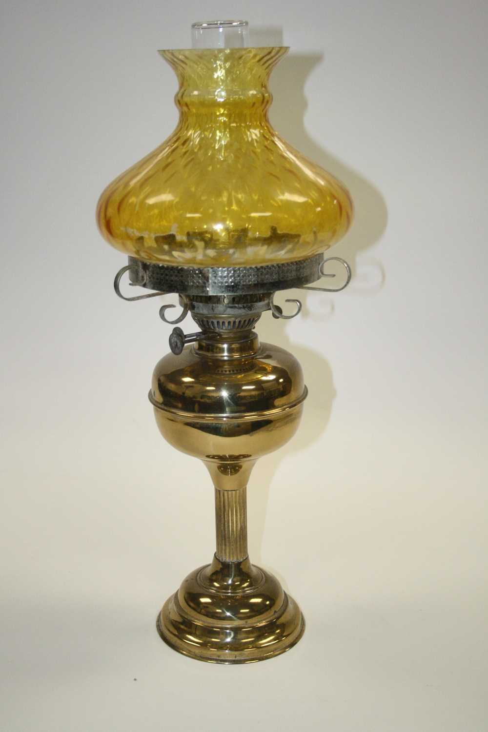 A late 19th century brass oil lamp, having amber tinted glass shade, h.58cm - Image 3 of 4