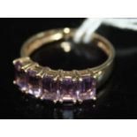 A modern 9ct gold amethyst set half hoop ring, as retailed by QVC, 3.1g, size U