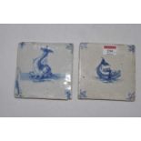 Two 19th century Delft tin-glazed earthenware wall tiles, each depicting a dolphin, 12.5 x 12.5cm