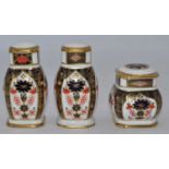 A Royal Crown Derby 1128 pattern imari porcelain three-piece table cruet set, the largest h.