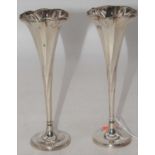 A pair of Edward VII silver trumpet shaped vases, Sheffield 1903, h.19cm, 4oz