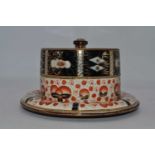 A 19th century imari palette cheese dish and cover, h.13cm