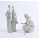 A Lladro porcelain figure group of two women, h.35cm; together with a Lladro porcelain figure of a