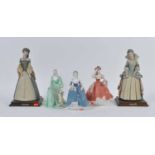 Three Coalport porcelain figures of ladies, the largest h.20cm; together with two Italian resin