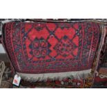 Four various very small Persian red and blue ground Tabriz rugs