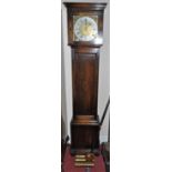 A 1930s oak longcase clock, the silvered and brass square dial signed A.E. Hopper, York, with