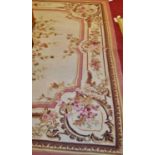 A large machine-made cream ground floral decorated rug, in the Aubusson taste, 430 x 300cmVery