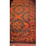 A Persian rust ground woollen Tabriz rug, 180 x 130cm