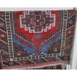 Three various small Persian red ground Tabriz rugs