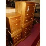 A pair of modern pine three-drawer bedroom chests, width 68cm, together with a further matching pair