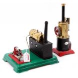 A miniature restored steam engine group to include a spirit-fired horizontal steam plant powering