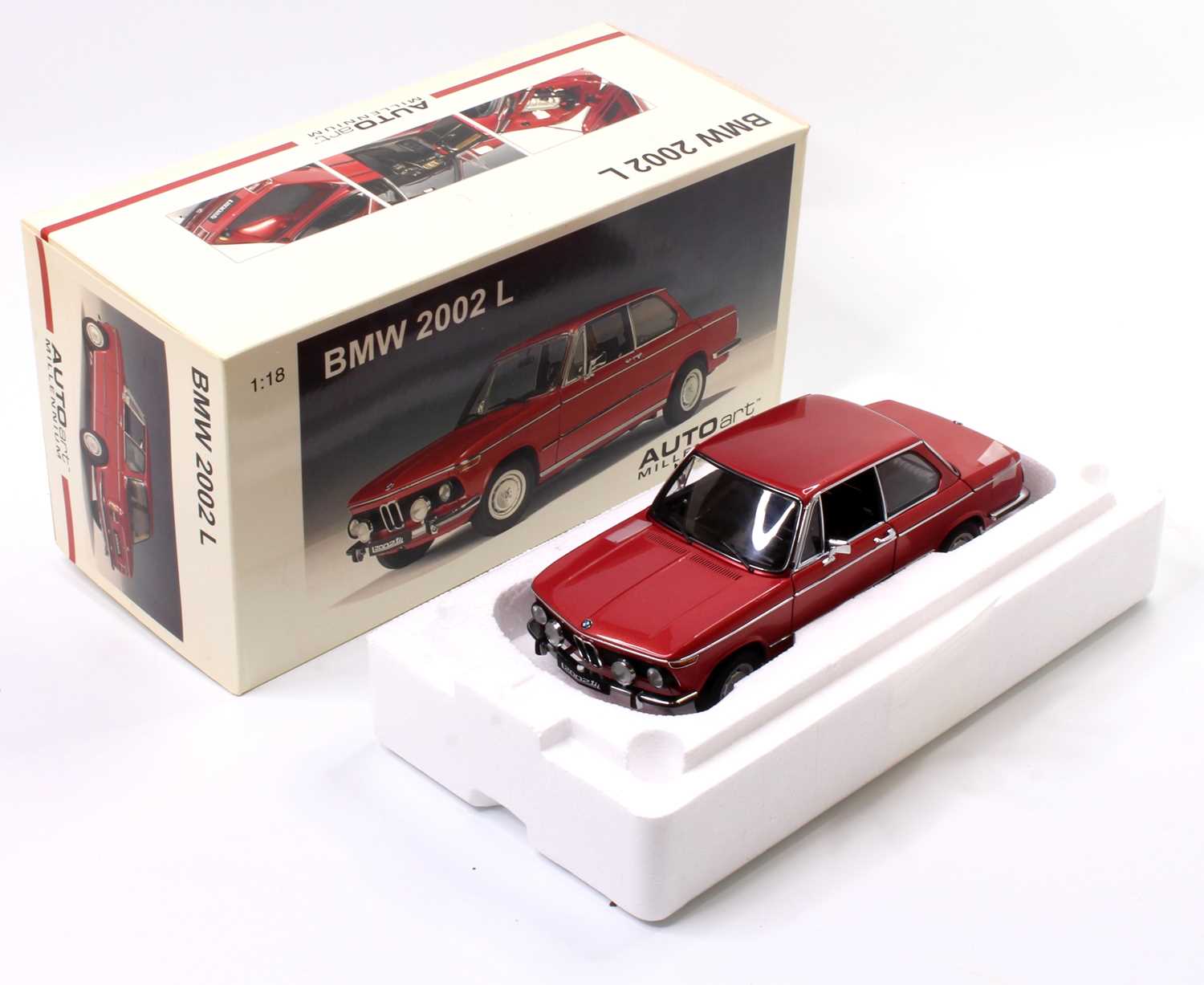 Auto Art Millennium 1/18th scale BMW 2002 L finished in red and housed in its original pictorial