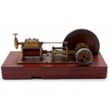 A scratch built to freelance design model of a stationary horizontal steam engine, comprising of