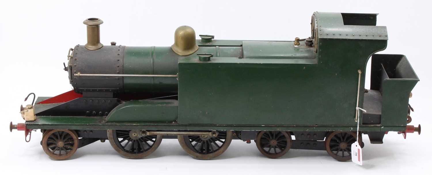 A 3½" gauge 2-4-4 live steam coal fired tank locomotive, finished in dark green with easy access