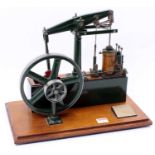 A very well engineered 1980s stationary beam engine, comprising of green painted body of usual