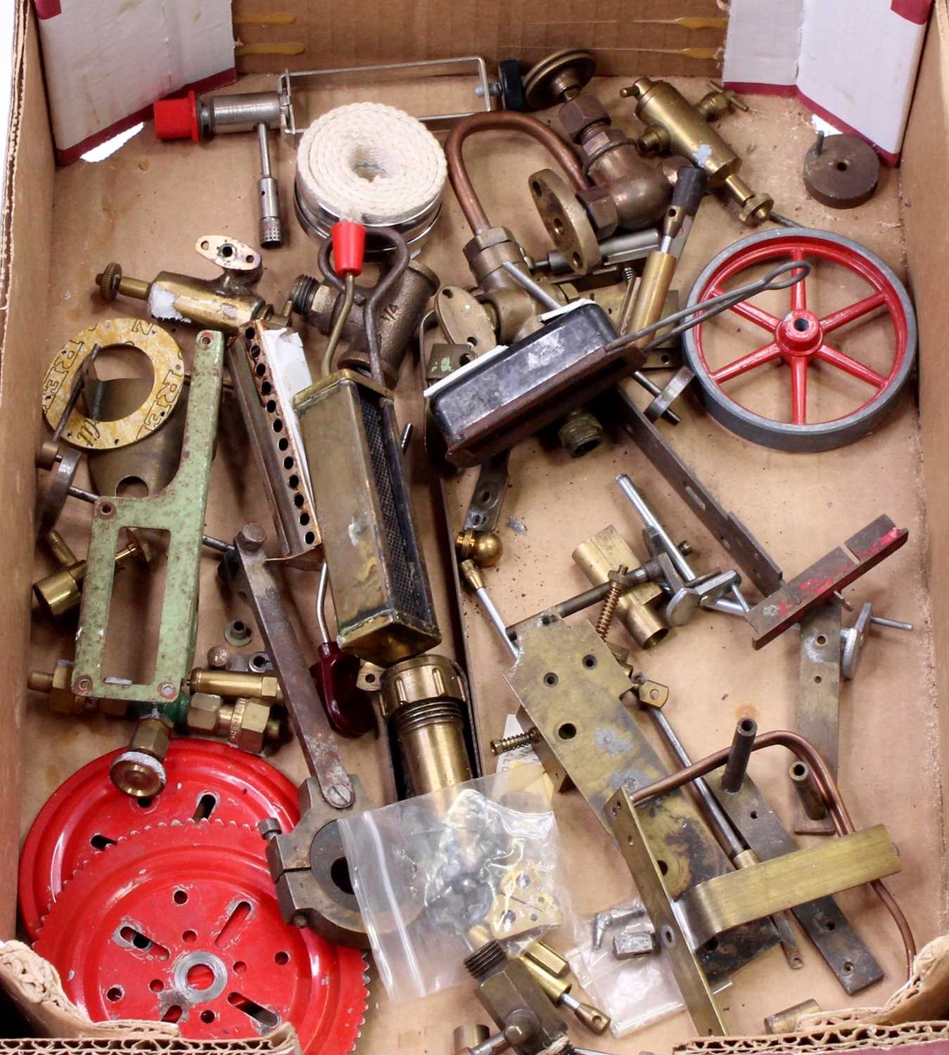 One tray containing a collection of various live steam and steam workshop components to include