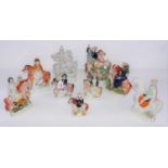 A collection of nine Victorian Staffordshire figures, to include Little Red Riding Hood etc