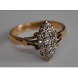 An 18ct gold diamond dress ring, the navette setting pave set with 15 stones, size I/J.