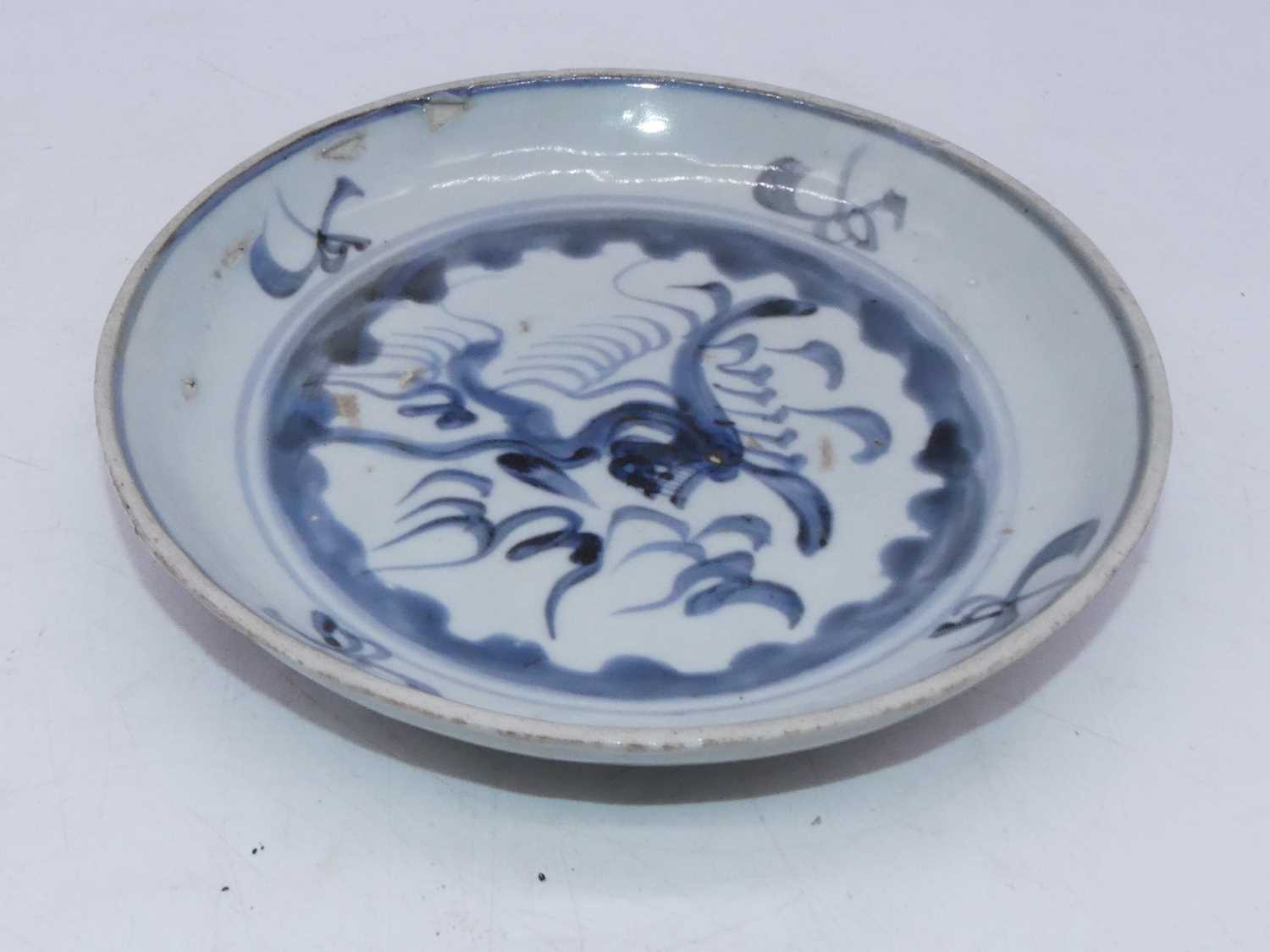 A 19th century Japanese export shallow bowl, underglazed blue decorated with a fish, unmarked dia. - Bild 3 aus 4