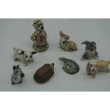 A collection of Wade and other miniature pottery animal figures