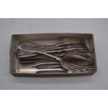 A matched set of thirteen 19th century silver Fiddle pattern forks, 34.8oz; together with a