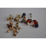 Assorted gilt metal and paste set ear studs