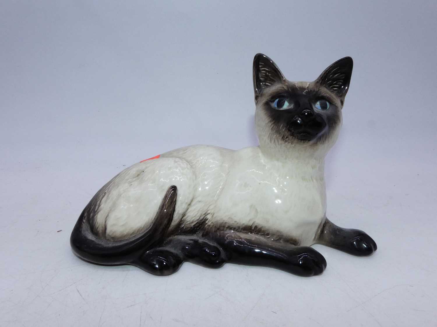 A Beswick figure of a Persian cat, seated looking up, model No.1867; together with a Beswick Siamese - Image 3 of 3