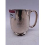 An early 20th century white metal tankard inscribed Calcutta, height 9cm, weight 7.7oz