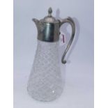 A claret jug, having a hobnail cut glass body and silver plated mount, h.30cm