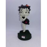 A reproduction cast iron doorstop in the form of Betty Boop