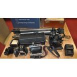 A collection of photography equipment, to include a Minolta 110 zoom SLR MkII camera, and a Canon