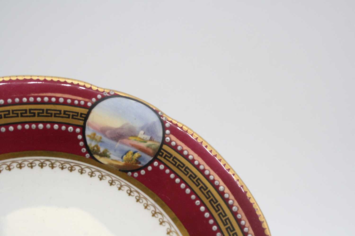 A Victorian part dessert service, each piece on a white ground with puce and Greek Key border, - Image 5 of 9