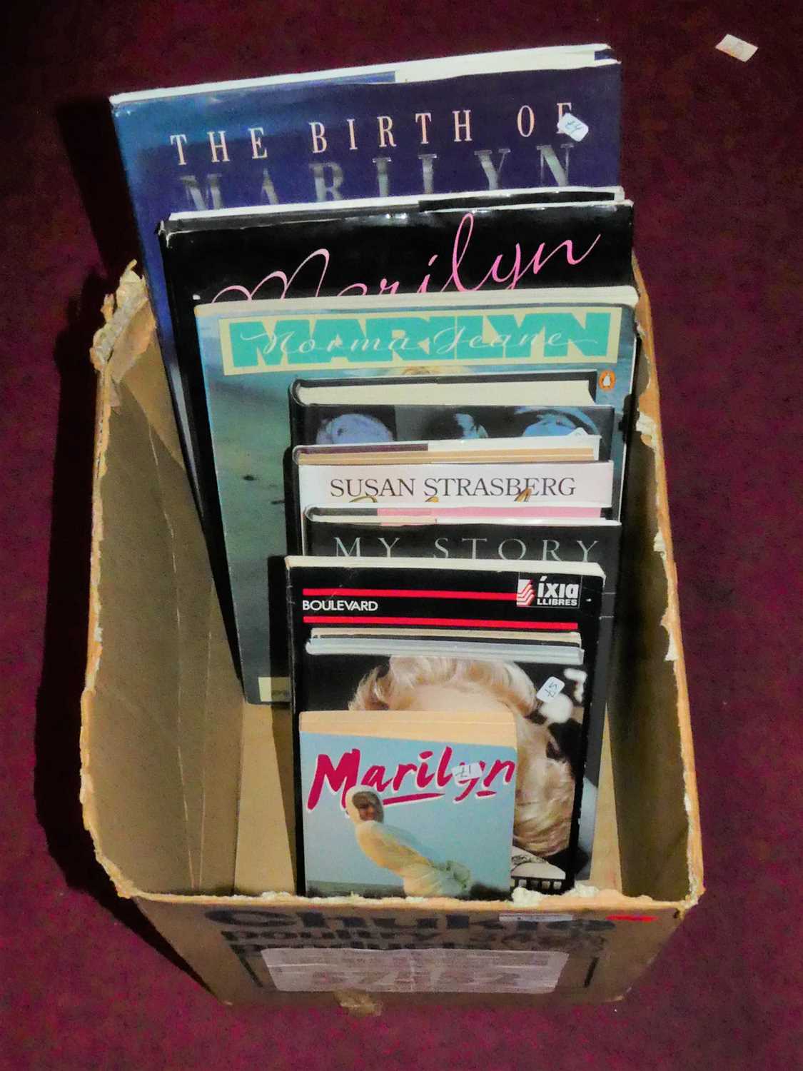 A box of books relating to Marilyn Monroe, to include The Birth of Marilyn The Lost Photographs of