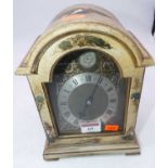 A 20th century mantel clock, in the 18th century style, the cream painted dome topped case with