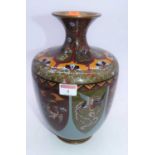 A Japanese cloisonne vase having a flared rim to slender neck and baluster body, each panel enamel